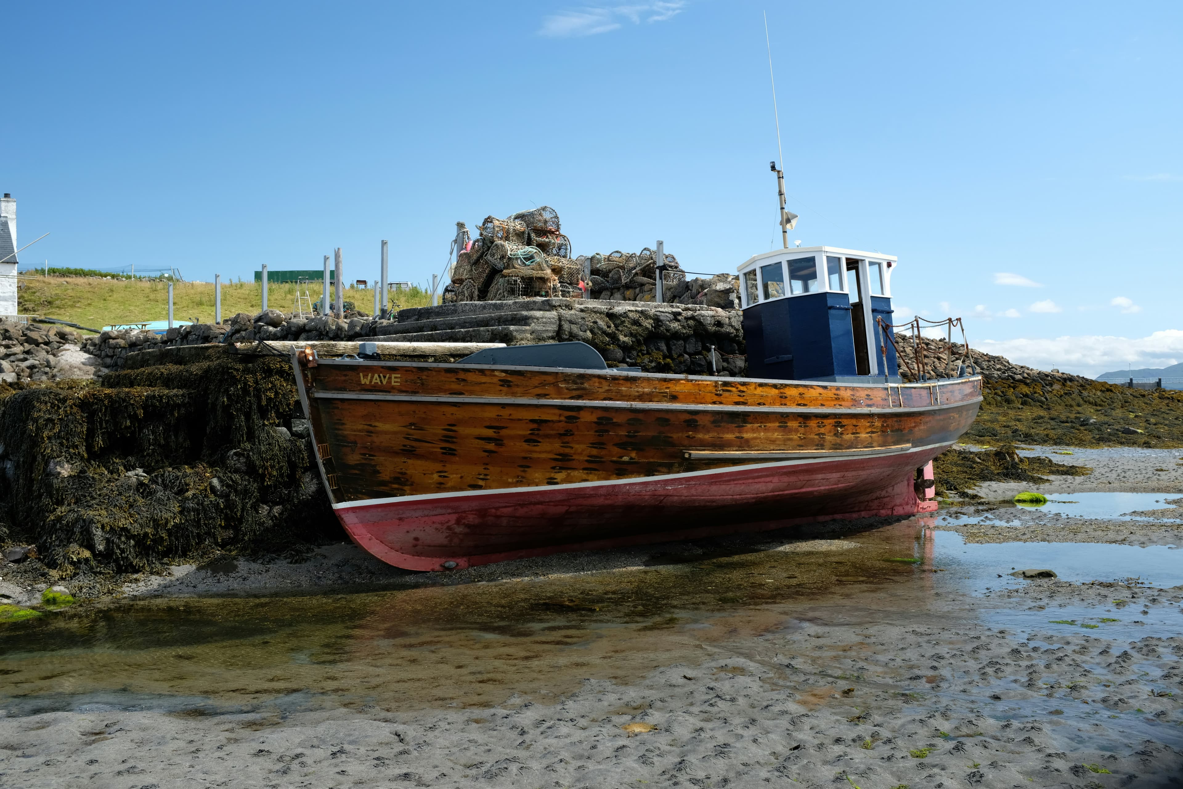 Boat waiting at low tide